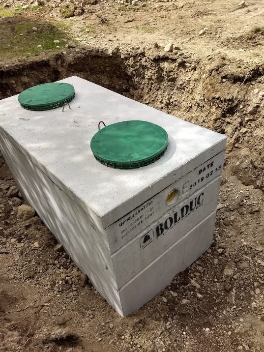 Installation of Concrete Septic Tank.